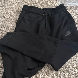 Youth Nike Black Fleece Joggers with Subtle Swoosh